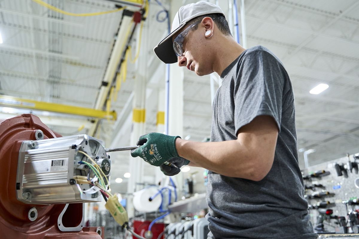 ABB Technician Assemblying Robot.jpg