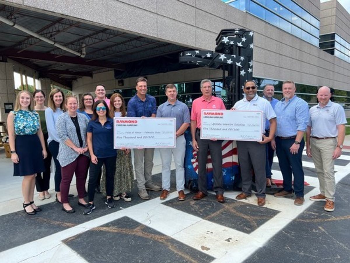 Carolina Handling donates proceeds from patriotic forklift auction