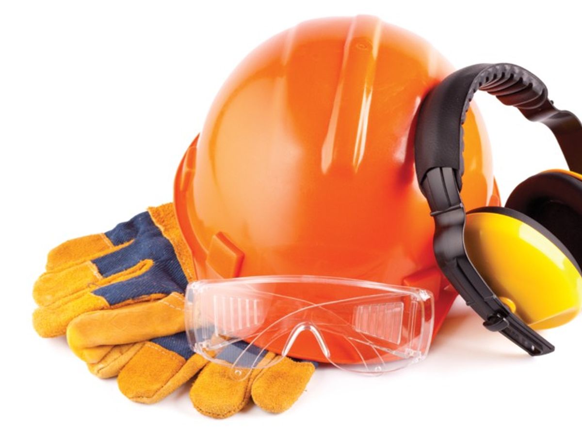 Hard hat, headphones, and work gloves