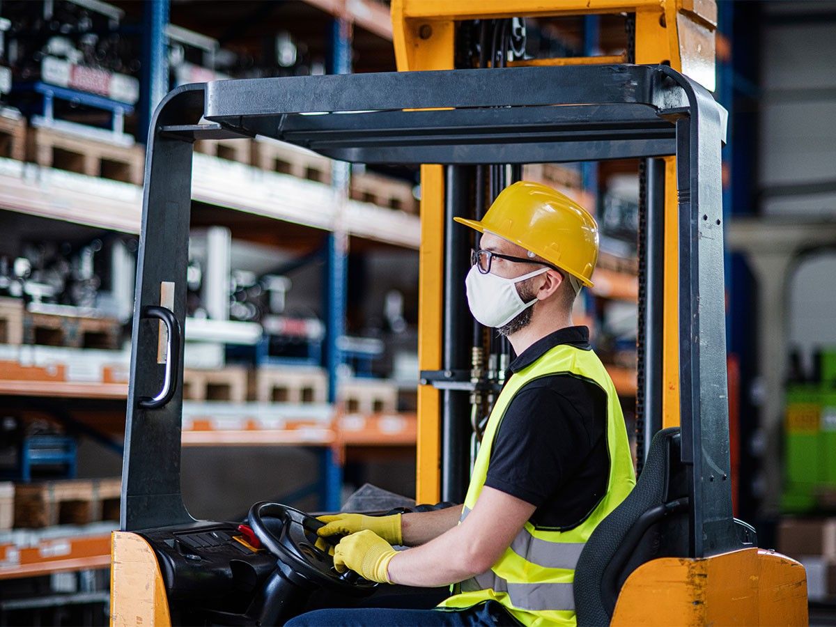 Person driving forklift